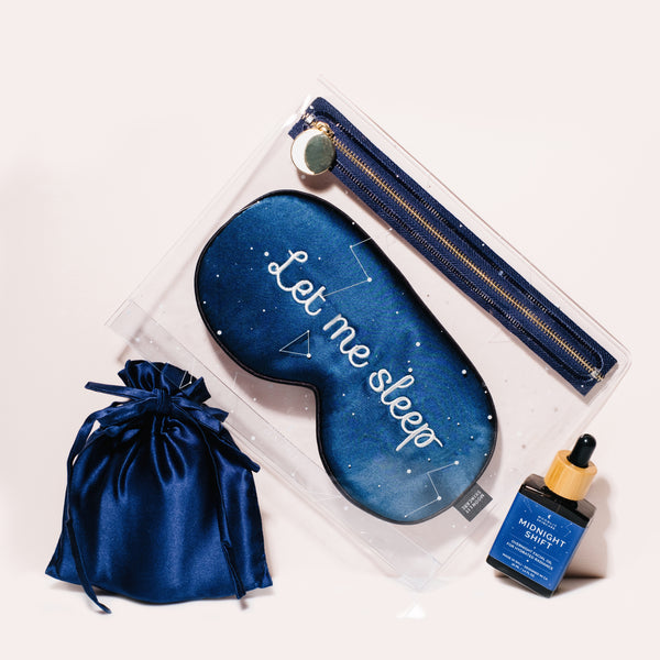 'Let Me Sleep' Navy Silk Eye Mask in Constellation Travel Pouch with Midnight Shift Overnight Facial Oil and navy blue silk pouch for rest and rejuvenation. 