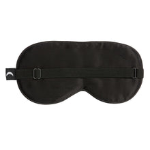 Interior paneling of the silk eyemask which is all black, has adjustable strap