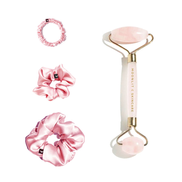 Summer blush bundle of silk scrunchie trio set including small, medium, and large sizes with rose quartz facial roller tool on white background