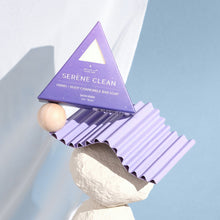Moonlit Skincare Serene Clean Soap on top of a structure with white curtain behind it on blue background