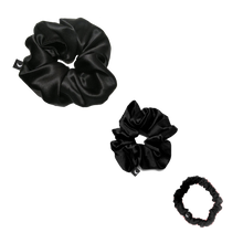 Moonlit Skincare Black Silk Scrunchie Trio Set including small, medium, and large sized scrunchies on white background 