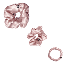 Moonlit Skincare Blush Pink Silk Scrunchie Trio Set including small, medium, and large sized scrunchies on white background